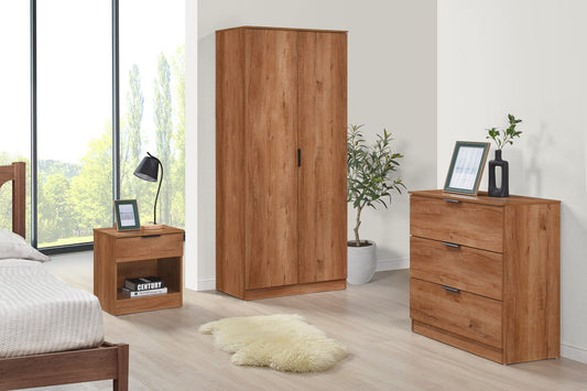 Wooden bedroom furniture set including a wardrobe, nightstand, and dresser.